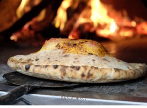 Elabora tu propia pizza en tu estufa de leña.